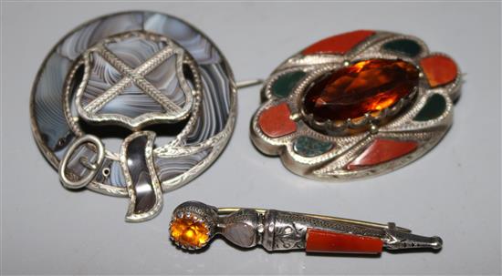 Two agate set Scottish brooches and a silver dirk brooch